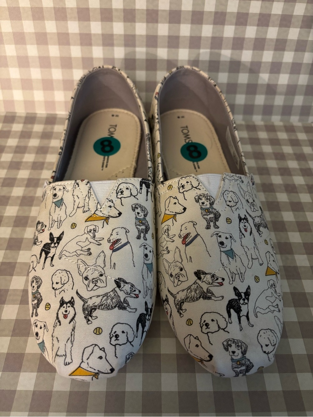 Toms Women’s White Canvas Slip-Ons with Dog Print